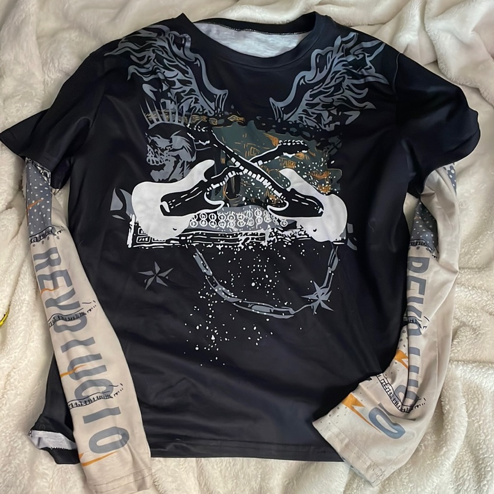 Guitar design, a large, black, yellow, white, grey, and dark green.